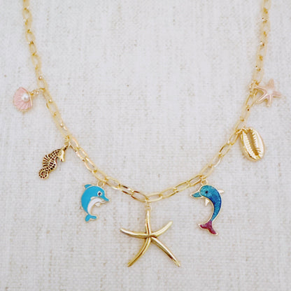 Ocean Play Charm Necklace – Dolphin, Starfish & Shell